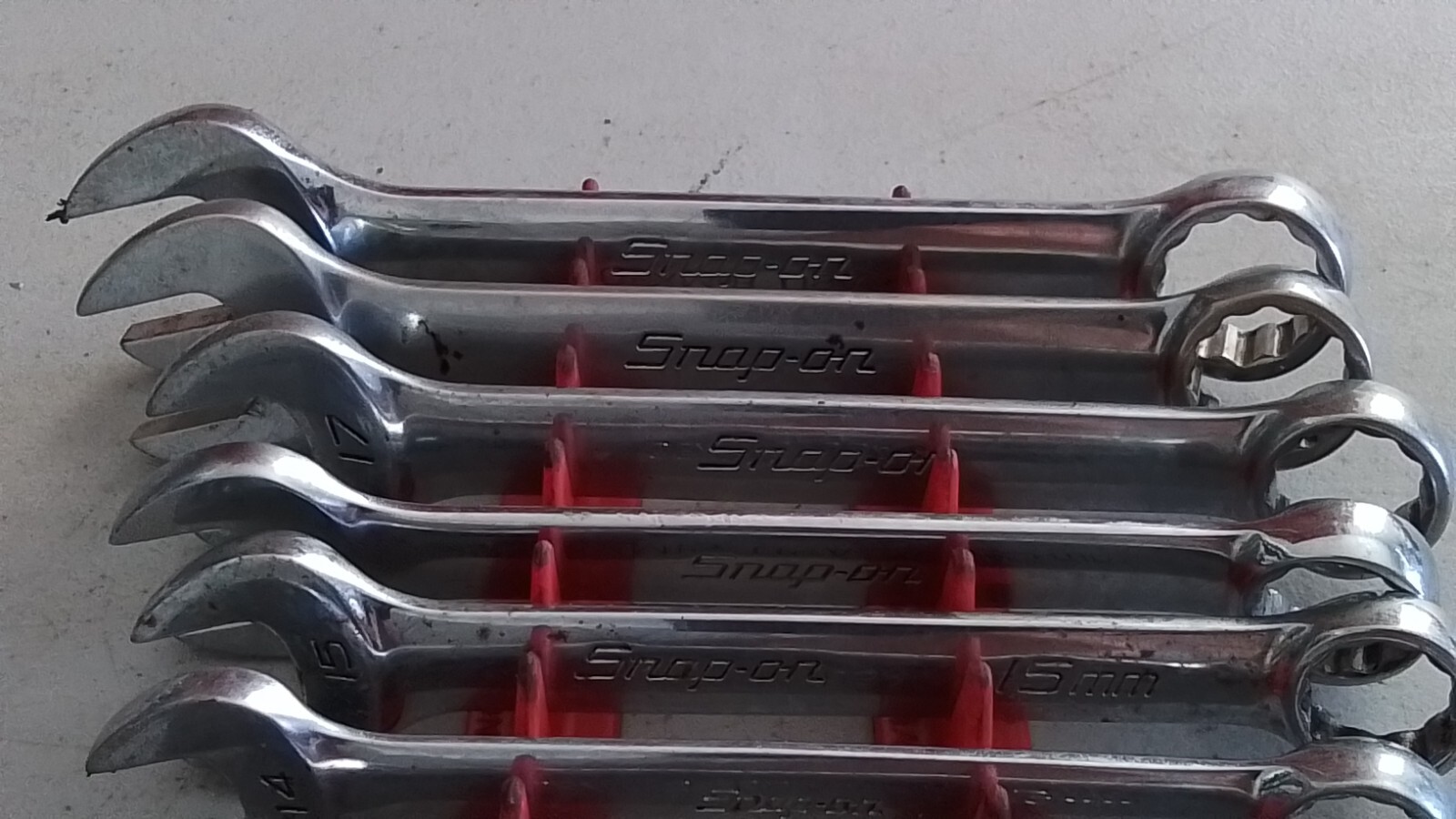 SNAP ON OEXM 10 PIECE SHORT METRIC COMBINATION WRENCH SET FROM 10MM. TO 19MM.