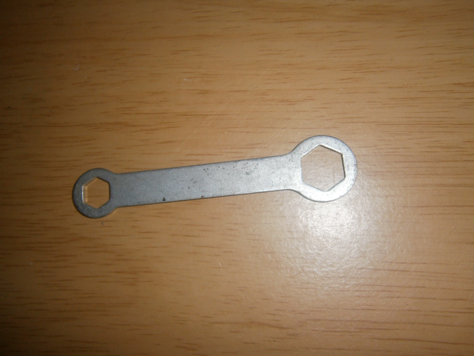 Vintage silver tone spanner. 10mm & 15mm ends.(E6d)