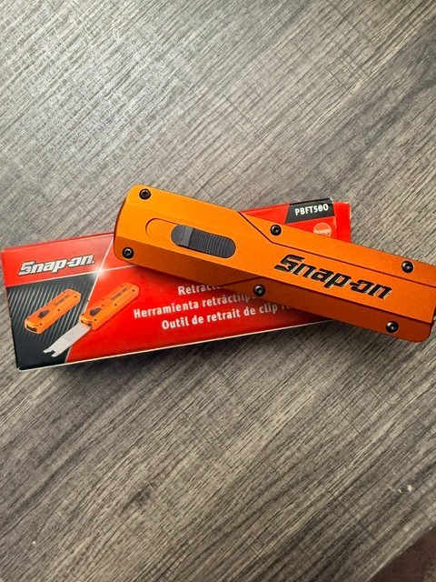 SNAP ON DOOR PANEL CLIP REMOVER-ORANGE BRAND NEW.
