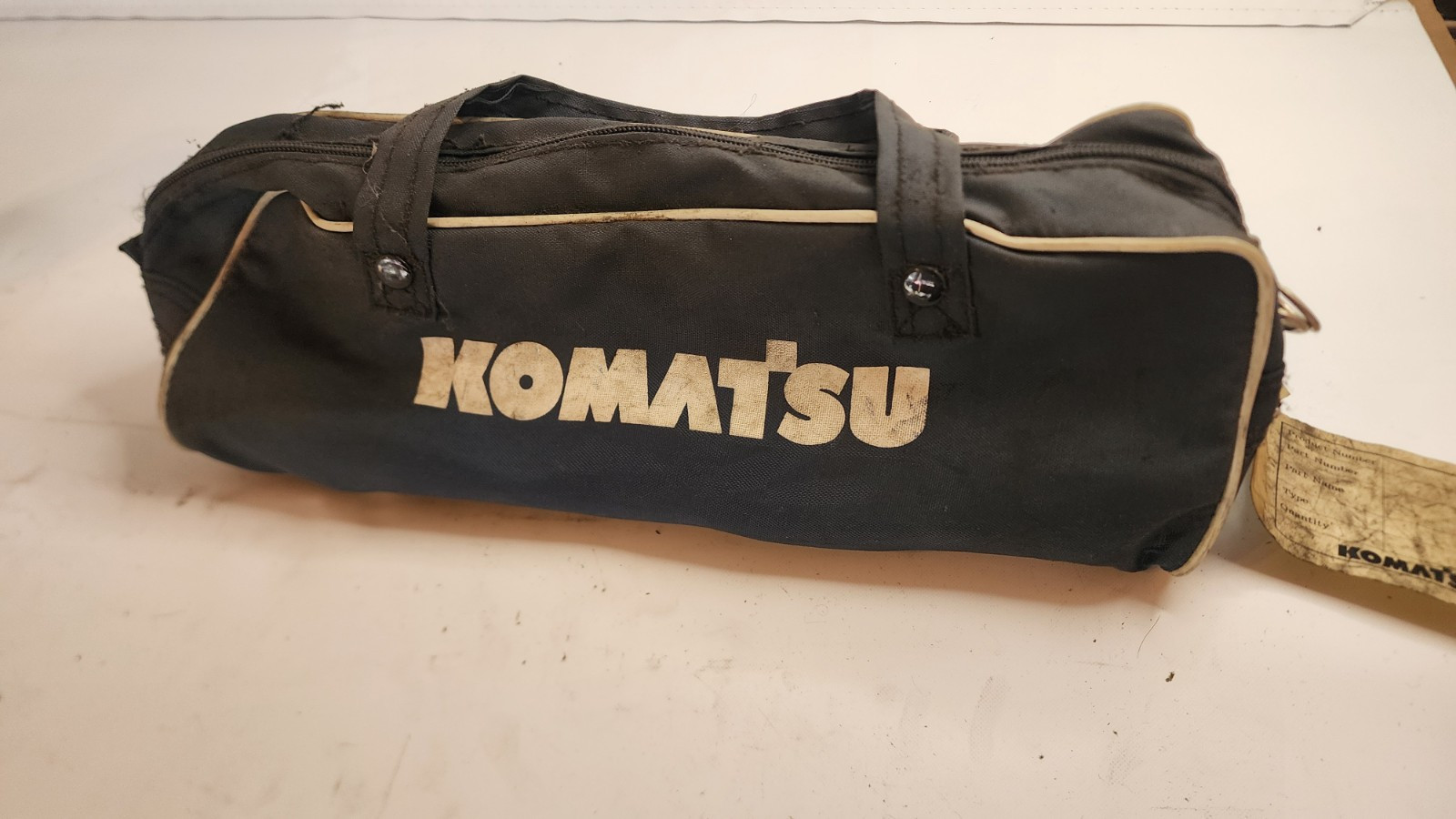 Assorted 50mm Wrenches (3) With (1) Socket. Inlcudes Bag And 2 Komatsu Brushes