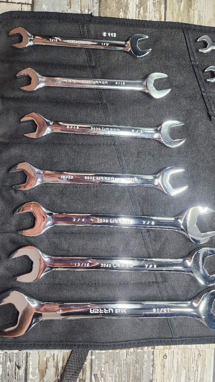 Urrea 10 Piece SAE Open End Wrench Set Hanging And Roll up Carrier 1/4″ – 1″