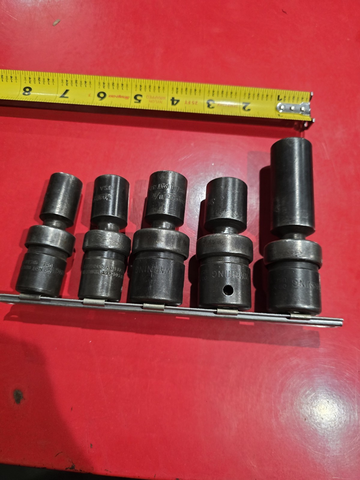 SNAP ON 1/2 DRIVE UNIVERSAL SWIVEL IMPACTS IN SAE. 4 PIECE SET WITH BONUS DEEP