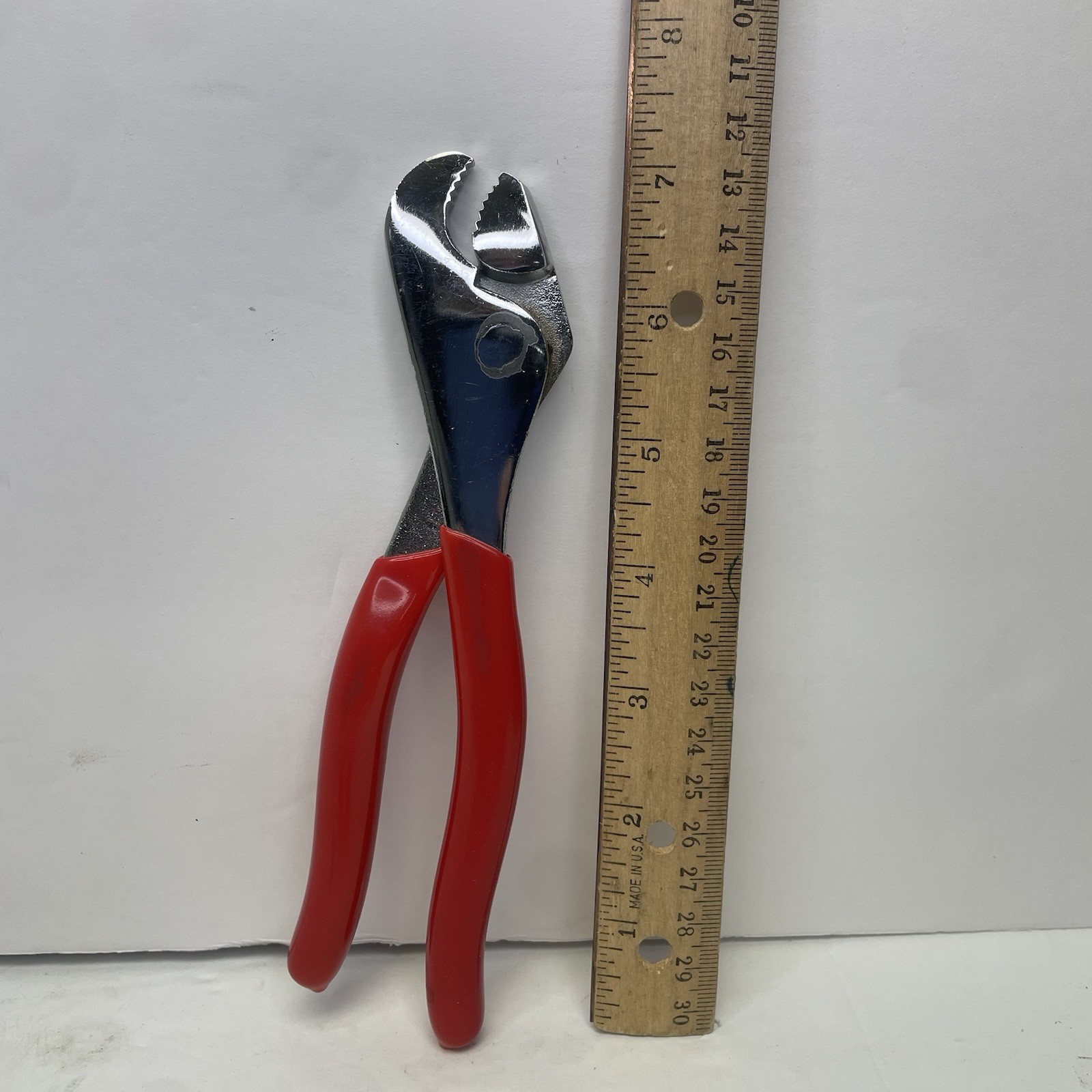 Angle nose battery nut pliers – red handle – 7.5 in – used