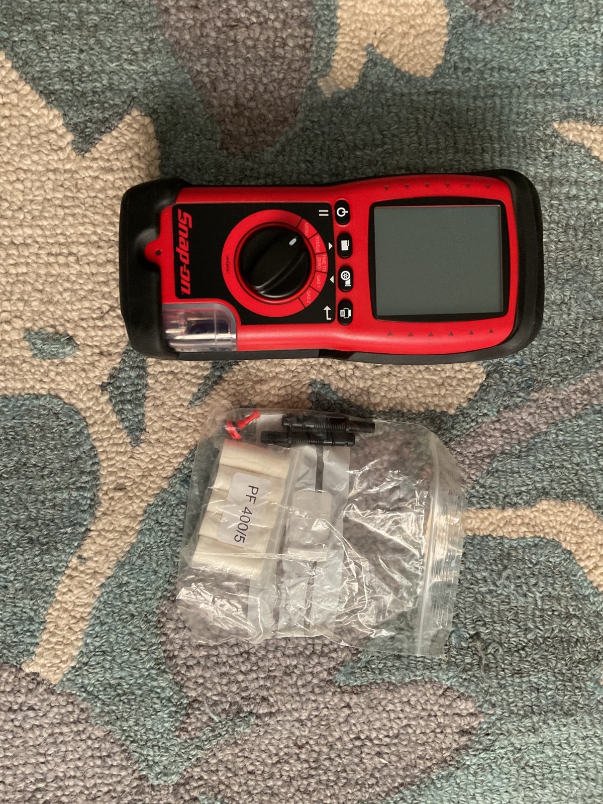 Brand: Snap-on Model: HHGASC Type: 5-Gas Exhaust Analyzer Color: Red/Black Condi