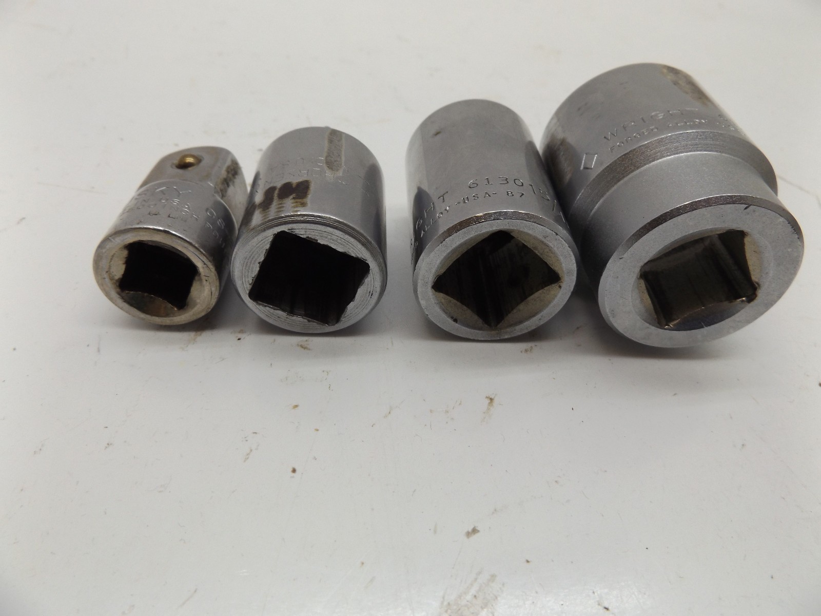 Wright 1-1/4″ & 15/16″ sockets 3/4″ dr Huskey 1/2″-3/4″ Thorsen 3/4 to 1/2″ 4pcs