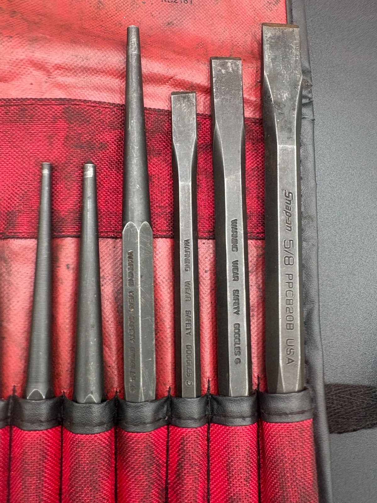 snap on 11pc punch and chisel set in soft roll case (some wear)