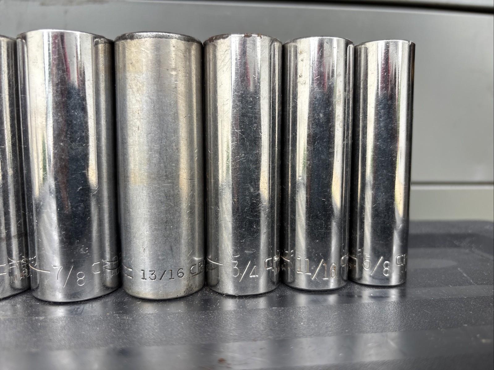 Craftsman Mixed Lot of (8) 12-point SAE deep sockets with a 1/2-inch drive.