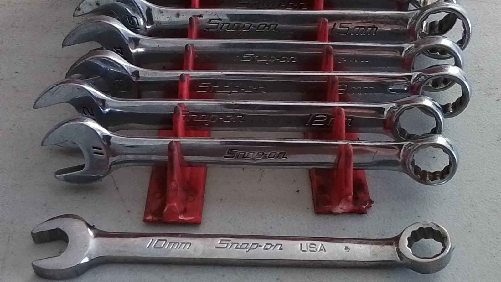 SNAP ON OEXM 10 PIECE SHORT METRIC COMBINATION WRENCH SET FROM 10MM. TO 19MM.