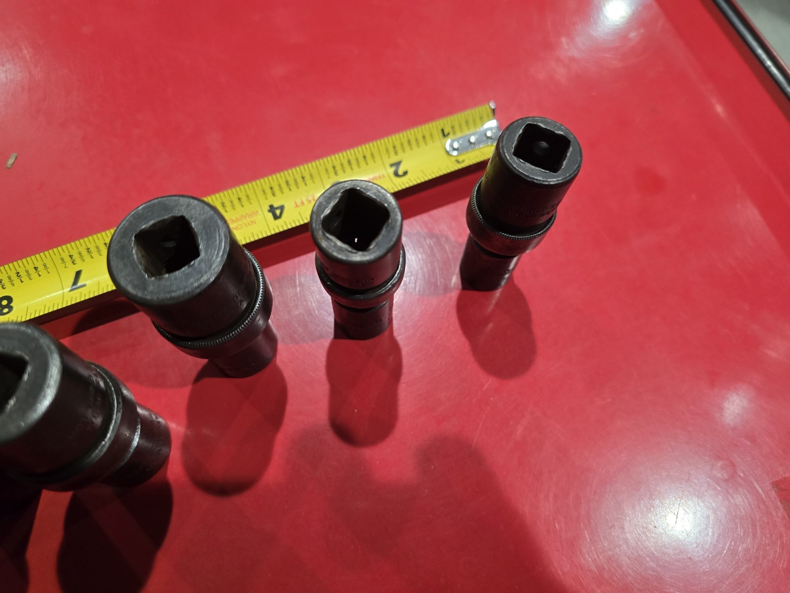 SNAP ON 1/2 DRIVE UNIVERSAL SWIVEL IMPACTS IN SAE. 4 PIECE SET WITH BONUS DEEP